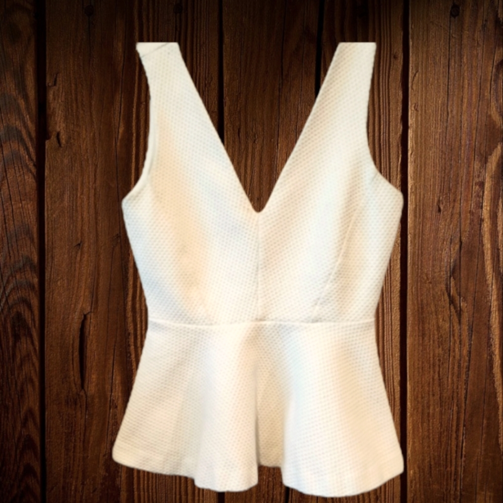 White Peplum Sleeveless Top